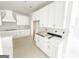 Kitchen featuring white cabinets and stainless steel appliances at 138 Silvercrest Dr # 169, Acworth, GA 30101