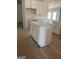 Kitchen island featuring a white cabinet, storage and counter space at 138 Silvercrest Dr # 169, Acworth, GA 30101