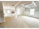 Spacious living room with coffered ceiling, modern fireplace, and abundant natural light at 138 Silvercrest Dr # 169, Acworth, GA 30101
