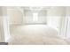Bright living room featuring wainscoting and a large window at 138 Silvercrest Dr # 169, Acworth, GA 30101