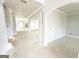 An open layout living space with classic white trim and decorative archway transitions at 138 Silvercrest Dr # 169, Acworth, GA 30101