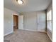 Bedroom with neutral walls, plush carpet, and natural light at 3741 Upland Dr, Mcdonough, GA 30253
