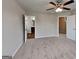 Carpeted main bedroom with an ensuite bathroom featuring dark wood vanity and a shower at 3741 Upland Dr, Mcdonough, GA 30253