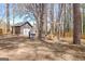 Beautiful backyard oasis with a play set, storage shed, and plenty of space for outdoor enjoyment at 104 Pine Pt, Peachtree City, GA 30269
