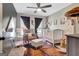 Cozy Bedroom with a crib, comfortable rocking chair, and natural light at 104 Pine Pt, Peachtree City, GA 30269