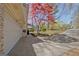 Attached two-car garage with ample driveway space in a suburban setting at 104 Pine Pt, Peachtree City, GA 30269