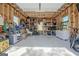 Spacious garage featuring shelving and ample storage space for tools, equipment, and household items at 104 Pine Pt, Peachtree City, GA 30269