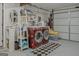 Convenient laundry room featuring a modern washer and dryer, plus storage shelves for organization at 104 Pine Pt, Peachtree City, GA 30269