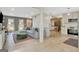 Inviting living space with an open layout connecting the living room and kitchen, perfect for entertaining at 104 Pine Pt, Peachtree City, GA 30269