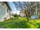 Spacious backyard with a storage shed and green lawn at 3685 Concordia Rd, Decatur, GA 30034