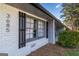 Charming house displaying the house number and dark shutters on white painted brick at 3685 Concordia Rd, Decatur, GA 30034