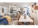Open kitchen and dining area with granite countertops, stainless appliances, and modern decor at 3685 Concordia Rd, Decatur, GA 30034