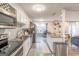 Modern kitchen with white cabinets, stainless steel appliances, and a stylish backsplash at 3685 Concordia Rd, Decatur, GA 30034