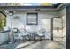 Covered patio with outdoor seating, great for relaxing or entertaining guests at 3685 Concordia Rd, Decatur, GA 30034