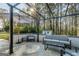 Back patio with comfortable seating including chairs and a couch under a pergola and nearby shed at 3685 Concordia Rd, Decatur, GA 30034