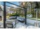 Back patio with comfortable seating including chairs and a couch under a pergola and patio heater at 3685 Concordia Rd, Decatur, GA 30034