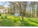 Backyard shed with a light blue exterior at 3685 Concordia Rd, Decatur, GA 30034