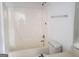 Bathroom with a standard bathtub, white toilet, and basic vanity at 50 Village Walk, Covington, GA 30016