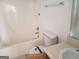 Standard bathroom with a tub/shower combo, toilet, and vanity at 50 Village Walk, Covington, GA 30016