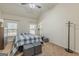 Bedroom with vaulted ceiling, fan, carpet floors, and a plaid comforter at 4050 Villagewood Ln, Ellenwood, GA 30294