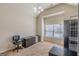 Bright bedroom showcasing a window and neutral walls with carpeted flooring at 4050 Villagewood Ln, Ellenwood, GA 30294