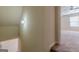 Stairway and view into the upstairs living area with carpet at 4050 Villagewood Ln, Ellenwood, GA 30294