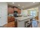Stylish kitchen with granite countertops, stainless appliances, and hardwood flooring at 4050 Villagewood Ln, Ellenwood, GA 30294