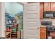 Well-stocked pantry features wire shelving and ample storage space next to the kitchen at 4050 Villagewood Ln, Ellenwood, GA 30294