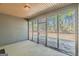 This home has a beautiful screened in porch with metal security gate at 4050 Villagewood Ln, Ellenwood, GA 30294