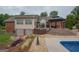 Backyard featuring a large gazebo and the home's rear elevation and patio at 245 Jewel Blf, Fayetteville, GA 30214