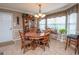 Bright dining area with a bay window and charming decor at 245 Jewel Blf, Fayetteville, GA 30214