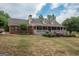 A charming one-story home with a brick exterior and a welcoming front porch at 245 Jewel Blf, Fayetteville, GA 30214