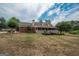 Inviting one-story brick home with a spacious front yard and a covered porch at 245 Jewel Blf, Fayetteville, GA 30214