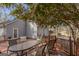 Backyard deck featuring an outdoor dining area with seating at 65 Dundee Pl, Sharpsburg, GA 30277