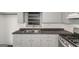 Bright kitchen with granite countertops and stainless steel appliances at 111 Highway 138 E, Stockbridge, GA 30281