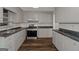 Spacious kitchen with granite countertops and stainless steel appliances at 111 Highway 138 E, Stockbridge, GA 30281
