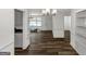 The living room has hardwood floors, built-in shelves, and plenty of natural light at 111 Highway 138 E, Stockbridge, GA 30281