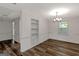 The living room has hardwood floors, built-in shelves, and a modern light fixture at 111 Highway 138 E, Stockbridge, GA 30281