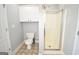 Bathroom with toilet, glass shower stall, and built in storage at 116 Ducati Dr, Mcdonough, GA 30252