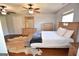 Spacious main bedroom with hardwood floors, ceiling fans and ample closet space at 116 Ducati Dr, Mcdonough, GA 30252