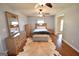 Spacious main bedroom with hardwood floors and well-lit by natural light at 116 Ducati Dr, Mcdonough, GA 30252