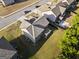 Aerial view of a single Gathering home with a fenced backyard and well-manicured lawn at 6870 Diamond Dr, Rex, GA 30273
