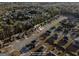 High angle aerial view of a home in a residential neighborhood on a sunny day at 6870 Diamond Dr, Rex, GA 30273