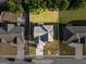 Aerial view of a single Gathering home with a well-maintained lawn and landscaping at 6870 Diamond Dr, Rex, GA 30273