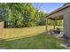 The property features a spacious backyard with a covered patio, perfect for entertaining and relaxation at 6870 Diamond Dr, Rex, GA 30273