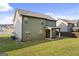 The home has a large backyard with a covered patio, providing an excellent outdoor living space at 6870 Diamond Dr, Rex, GA 30273