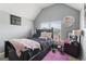 Stylish bedroom featuring carpet, gray walls, natural light, and modern decor at 6870 Diamond Dr, Rex, GA 30273
