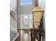 Grand foyer with hardwood floors, decorative staircase, an entry door with sidelights, and high ceilings at 6870 Diamond Dr, Rex, GA 30273