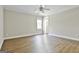 Spacious bedroom with hardwood floors, base molding and natural light at 410 Denton Cir, Fayetteville, GA 30215