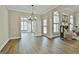 Bright dining room offers great flow with access to living room and kitchen at 410 Denton Cir, Fayetteville, GA 30215